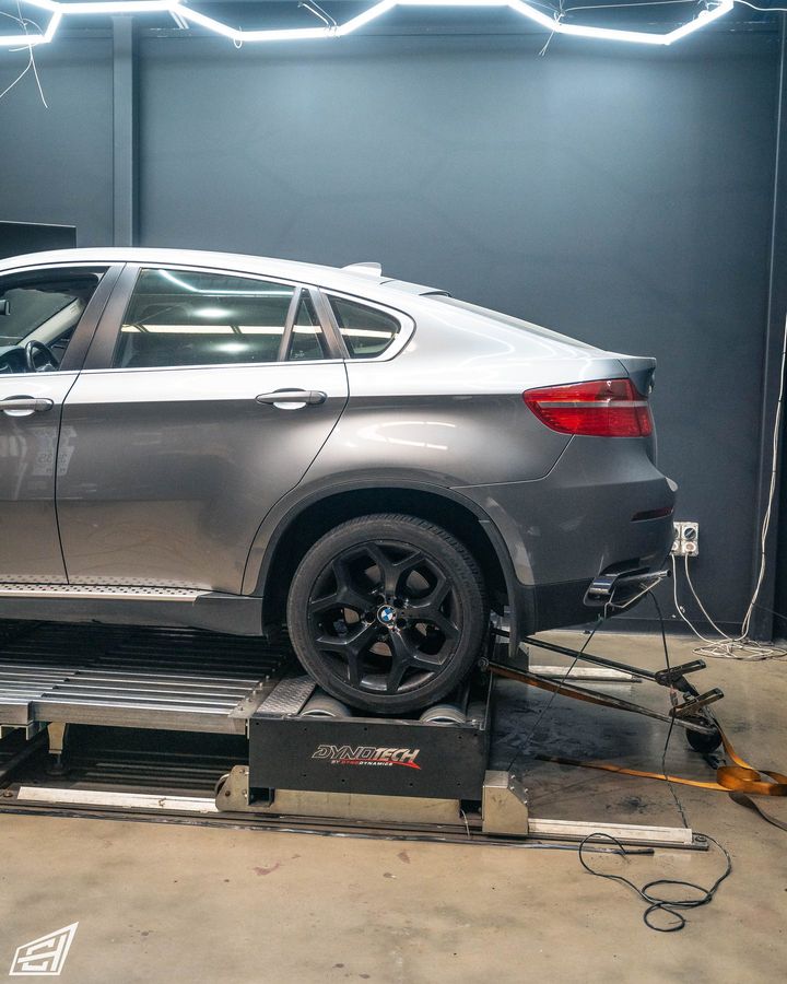 Grey BMW X6 on the dyno in the workshop