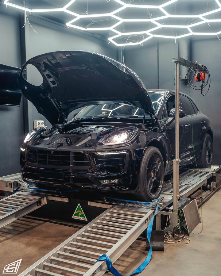 Black Porsche Macan GTS on the dyno with its bonnet open